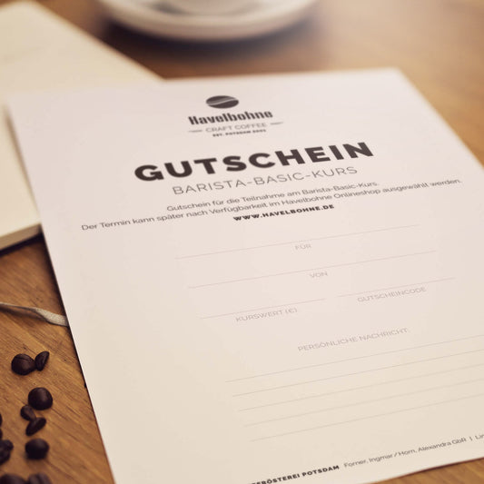 ausgedruckter A4-Gutschein auf einem Holztisch